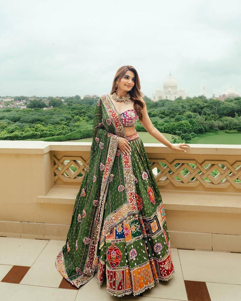 Navratri Special Muslin Mirror Work Green Lehengha Choli