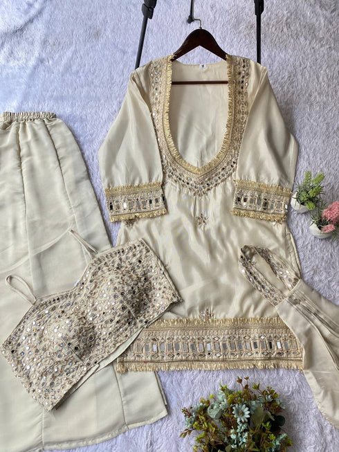 Cut work embroidery detail on soft organza top
