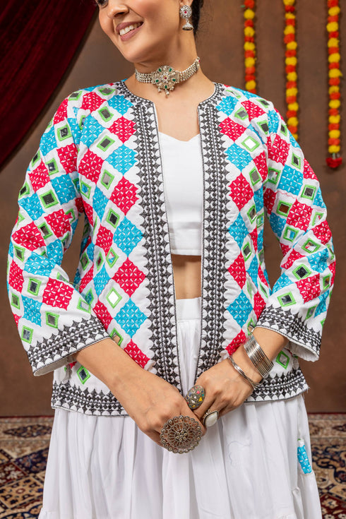 Three layer ruffle white lehenga with 6 metre flair