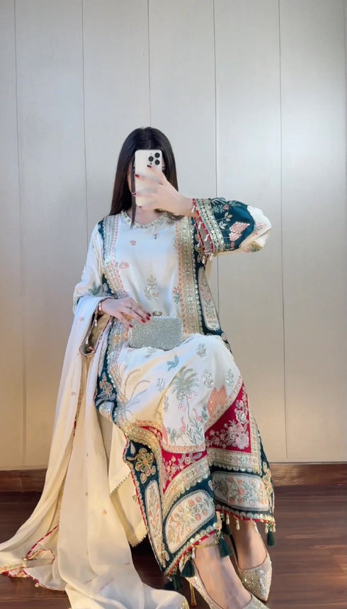 Festive kaftan set with green tassel hem