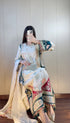 Festive kaftan set with green tassel hem