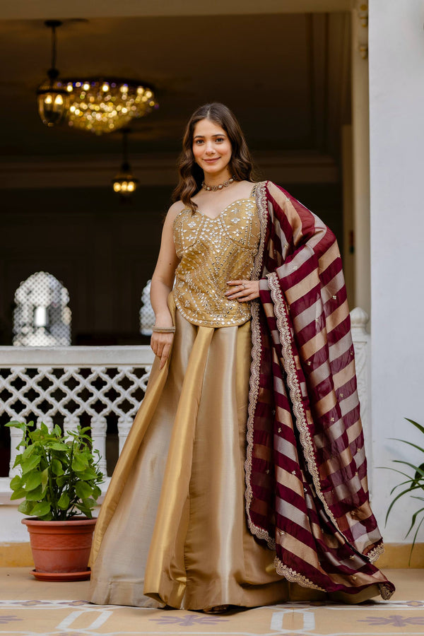 Gold Banarasi viscose lehenga with mirror work blouse